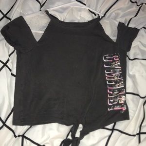 Dark gray, justice, crop that says “GYMNAST”